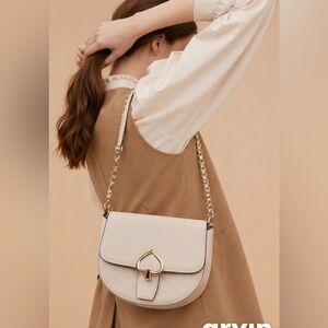 Kate Spade Cream Crossbody Gold Accents Robyn with hear clasp has original tags